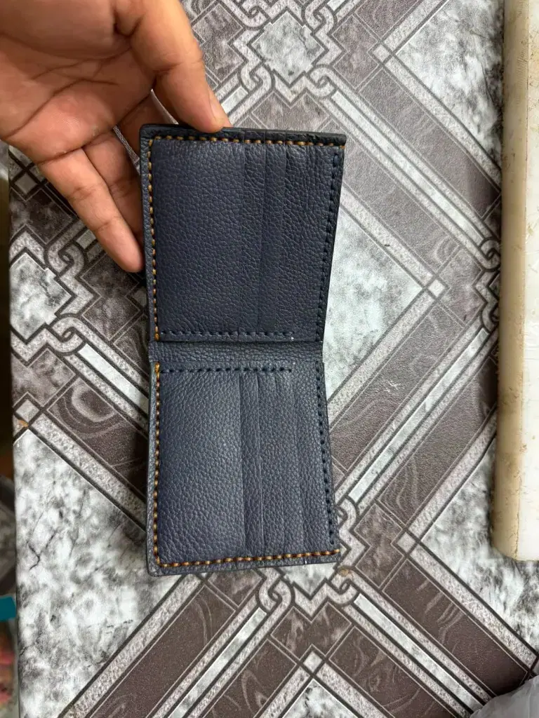 Navy Pebble Grain Hand-Stitched Bifold — leather product photo 1 of 1
